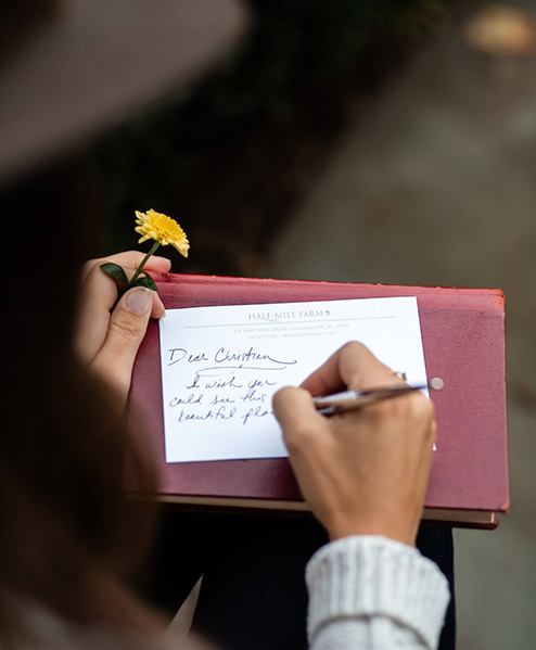 Hand writing a letter